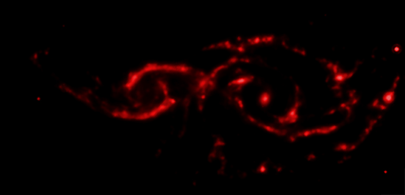 Illustration for article titled This Galactic Collision Is A Beautiful Spawning Ground For Supernovae